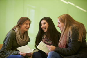 Three students studing together at the Student Success Center.