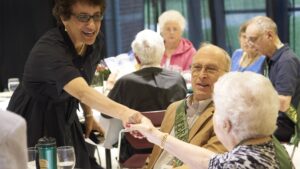 Linda LeMura with alumni