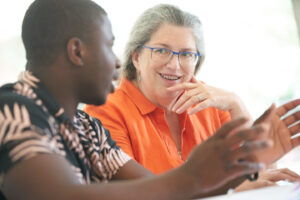 Professor talking to student