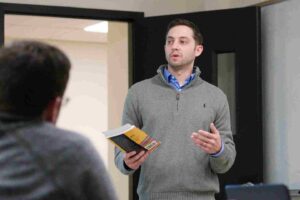 EdD student presenting in a classroom