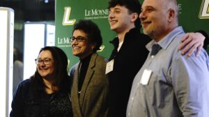 President Linda LeMura with accepted student and family.