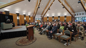 Panoramic view of the Panasci Family Chapel filled with attendees for the Stories in Space lecture.