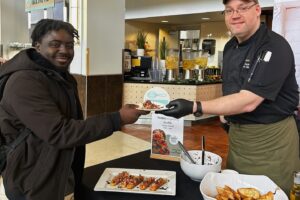 Student participating in Kitchen 101