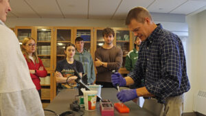 Devon Keeney with students