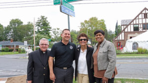 Fr. Don Kirby, County Executive Ryan McMahon, President Linda LeMura, and Syracuse Mayor Sharon Owens